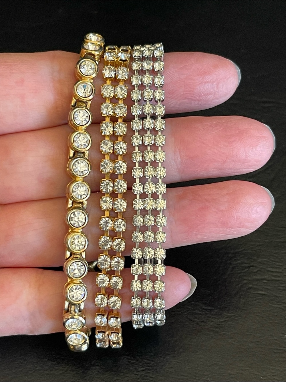 3 vintage rhinestone bracelets.